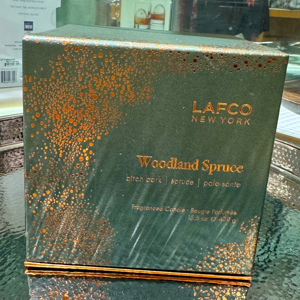 The highly fragrant and desirable Lafco Woodland spruce candle 15.5 oz